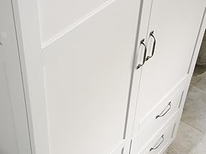 Storage cabinet showing reversible door configuring