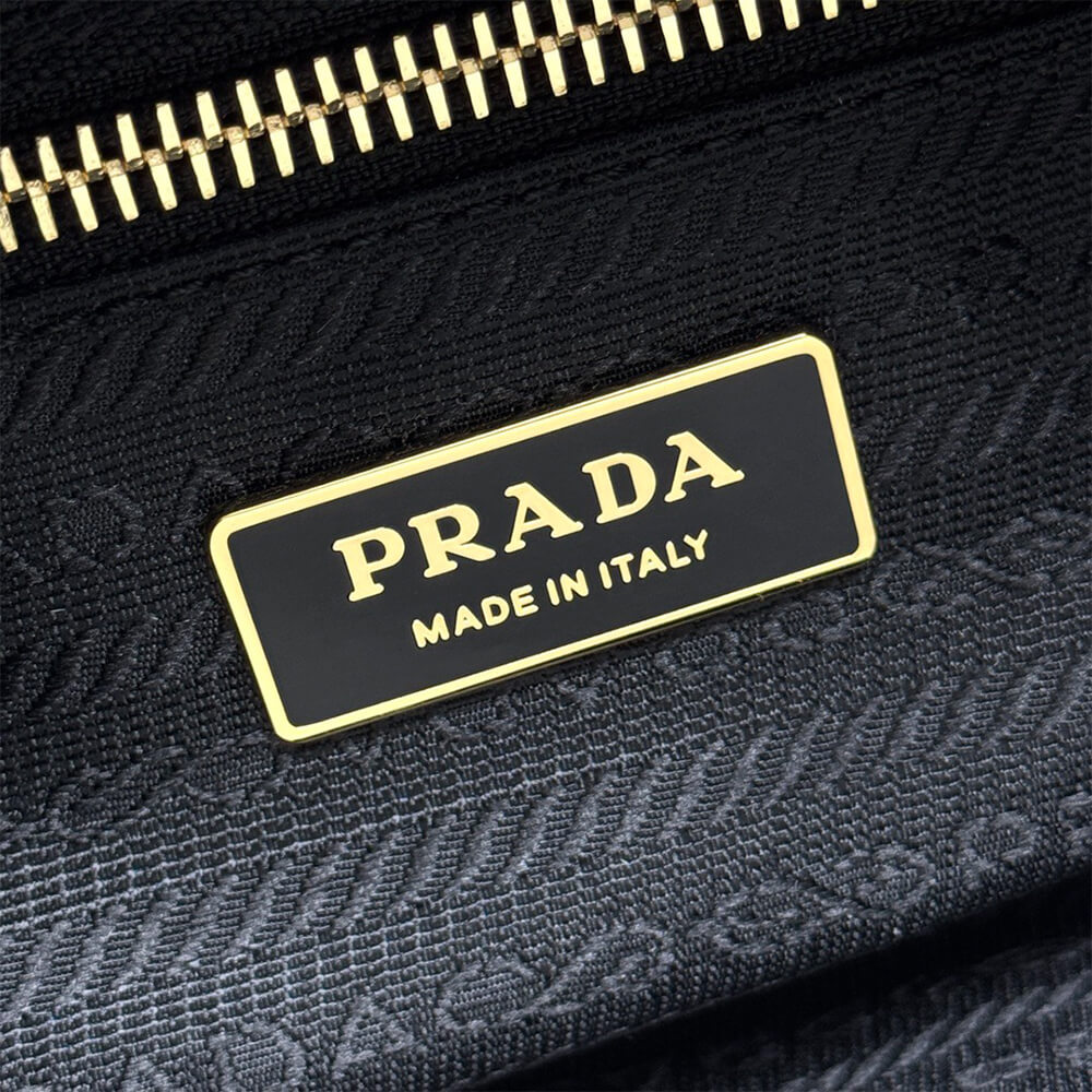 Prada Dangle medium leather top-handle bag - Replica Luxury Bags™