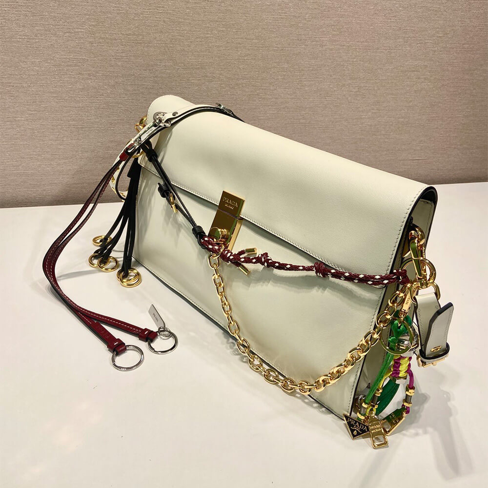 Prada Soft Sound large leather shoulder bag with charms - Replica Luxury Bags™