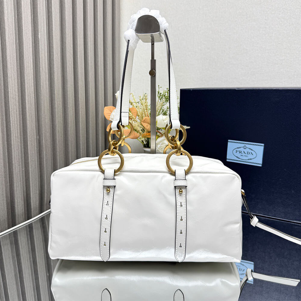 Prada Dangle medium leather top-handle bag - Replica Luxury Bags™