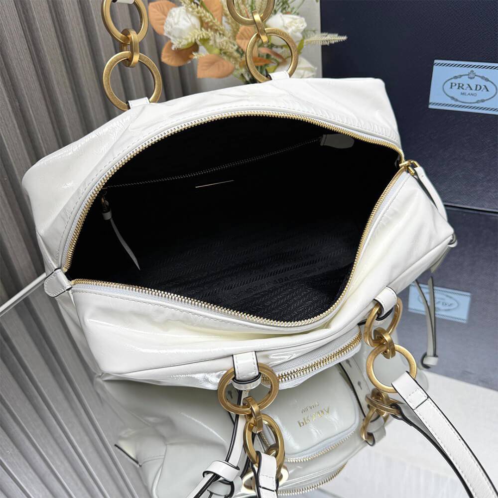 Prada Dangle medium leather top-handle bag - Replica Luxury Bags™