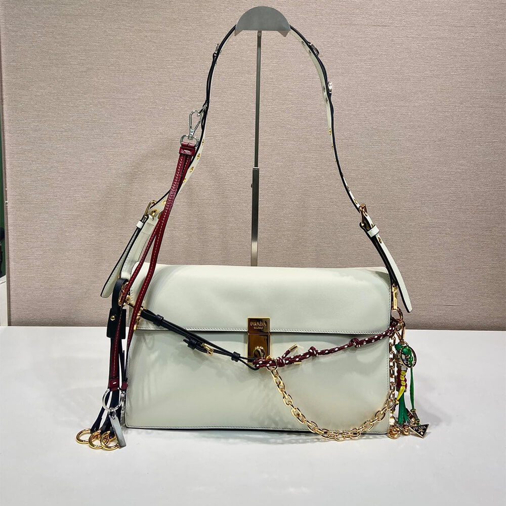 Prada Soft Sound large leather shoulder bag with charms - Replica Luxury Bags™