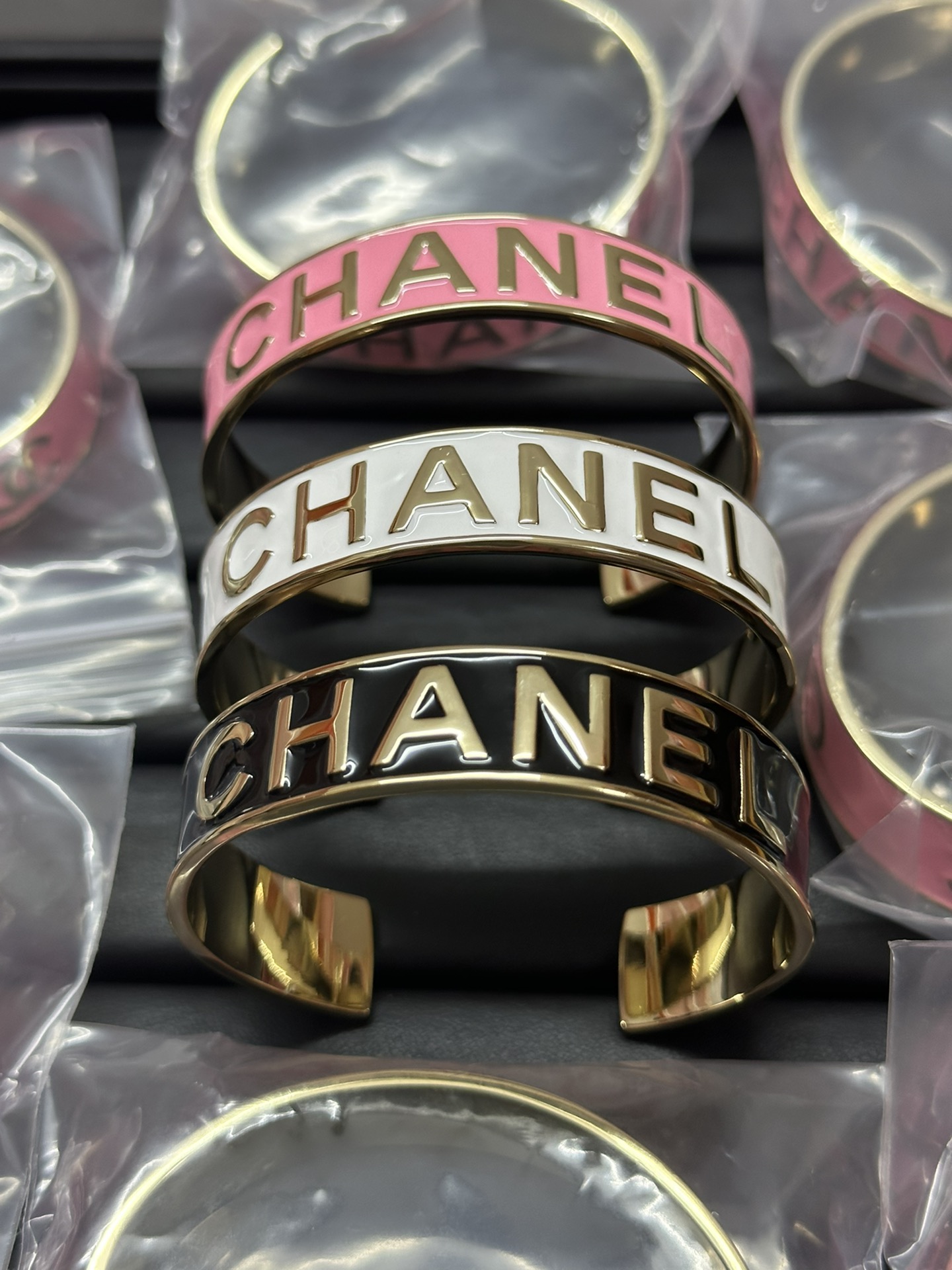 Chanel Embossed Monogram Open Cuff Bangle Bracelet - Rep Fashion™