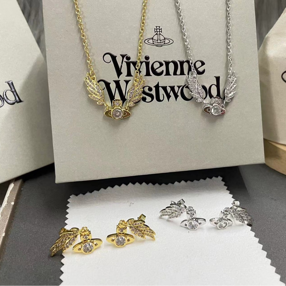 Vivienne Westwood Angel Wing Saturn Earrings - Rep Fashion™