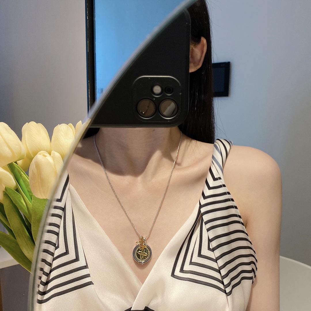 Louis Vuitton Two-Sided Silver Gold Round Rotating Pendant Necklace - Rep Fashion™