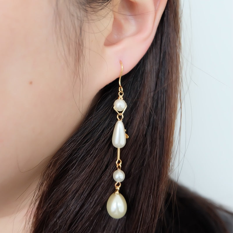 Vivienne Westwood Teardrop Pearl Saturn Earrings - Rep Fashion™