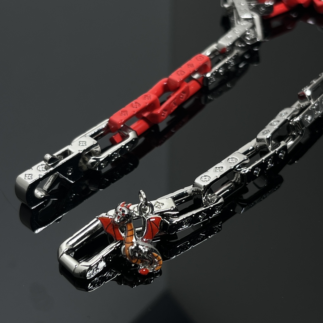 Louis Vuitton Dinosaur Charm Monogram Necklace - Rep Fashion™