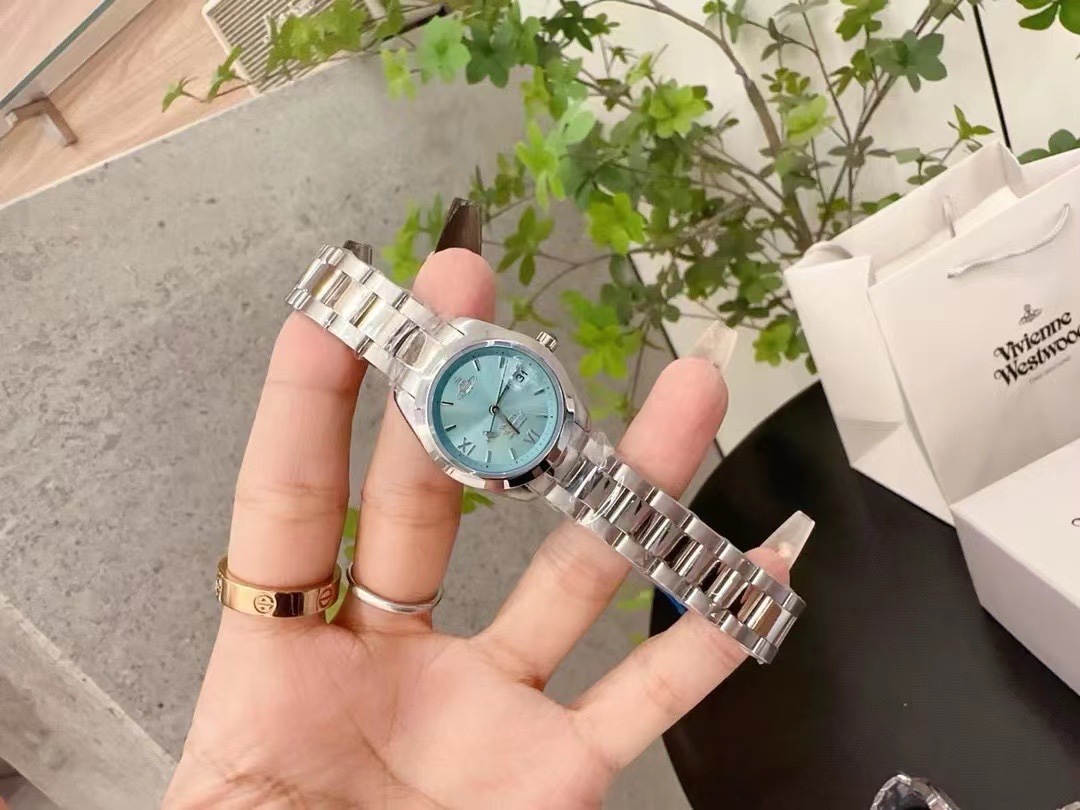 Vivienne Westwood Light Blue Dial Silver Band Saturn Watch - 28MM - Rep Fashion™