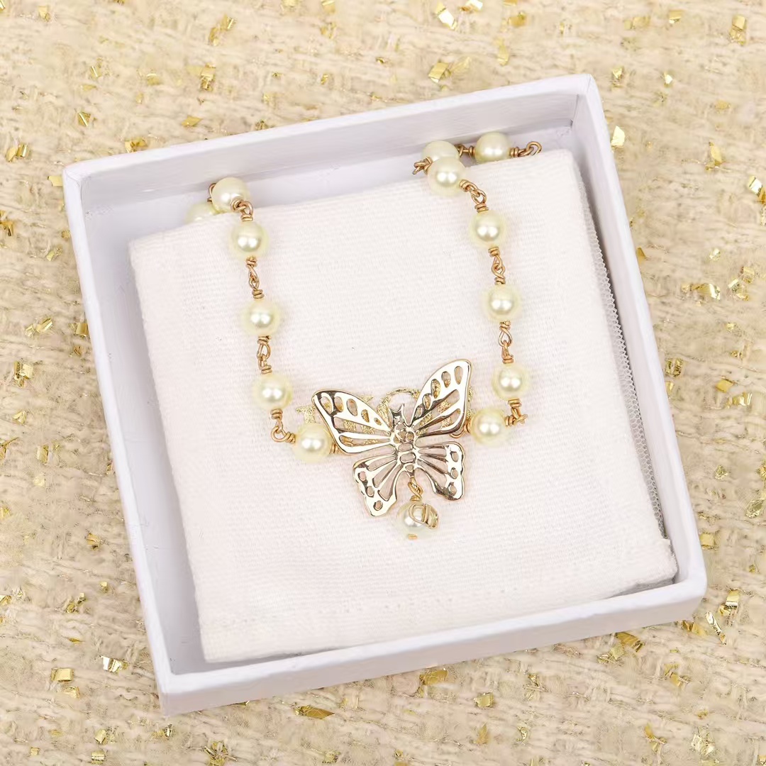 Dior Hollow Butterfly Pendant Pearl Necklace - Rep Fashion™