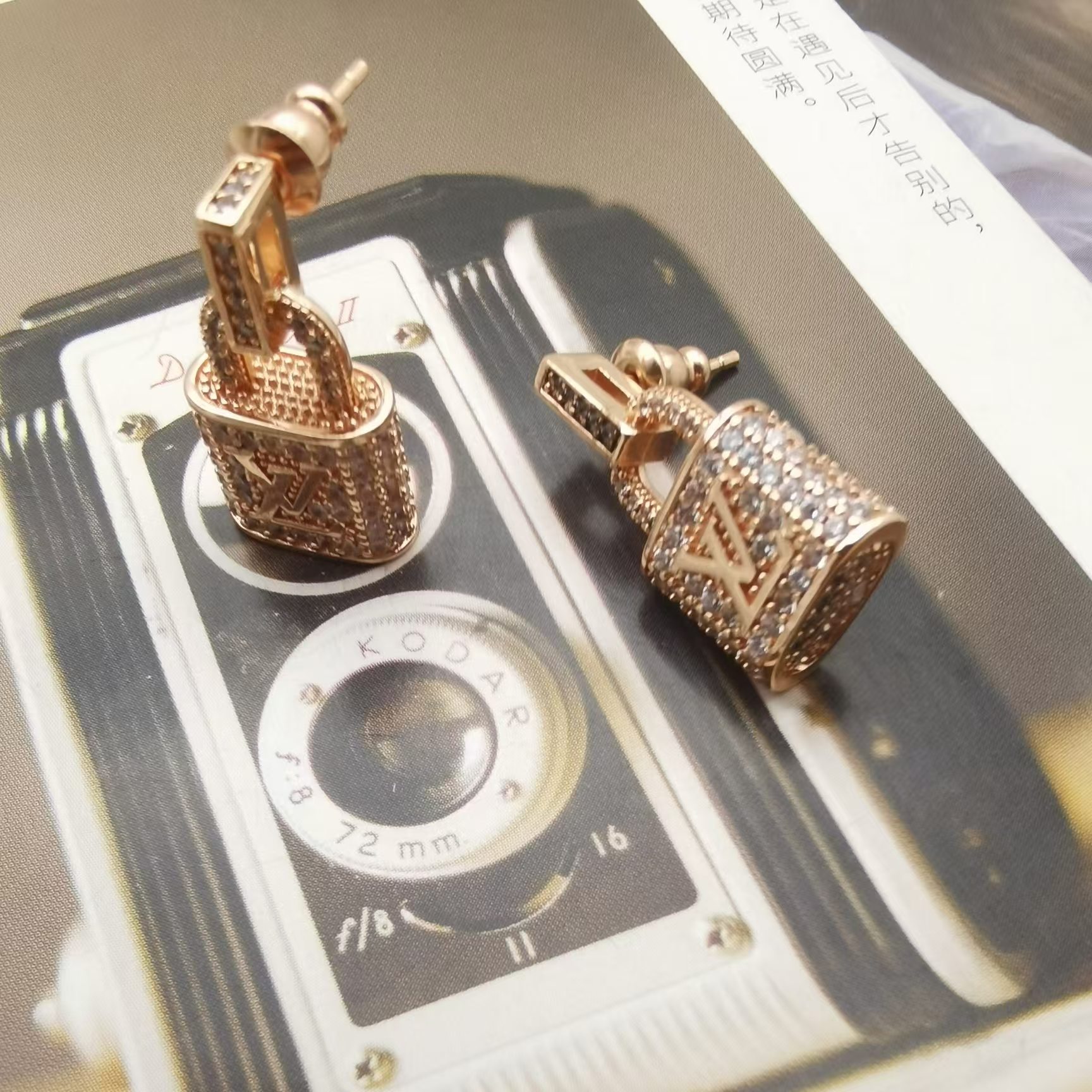 Louis Vuitton Lock Earrings - Rep Fashion™