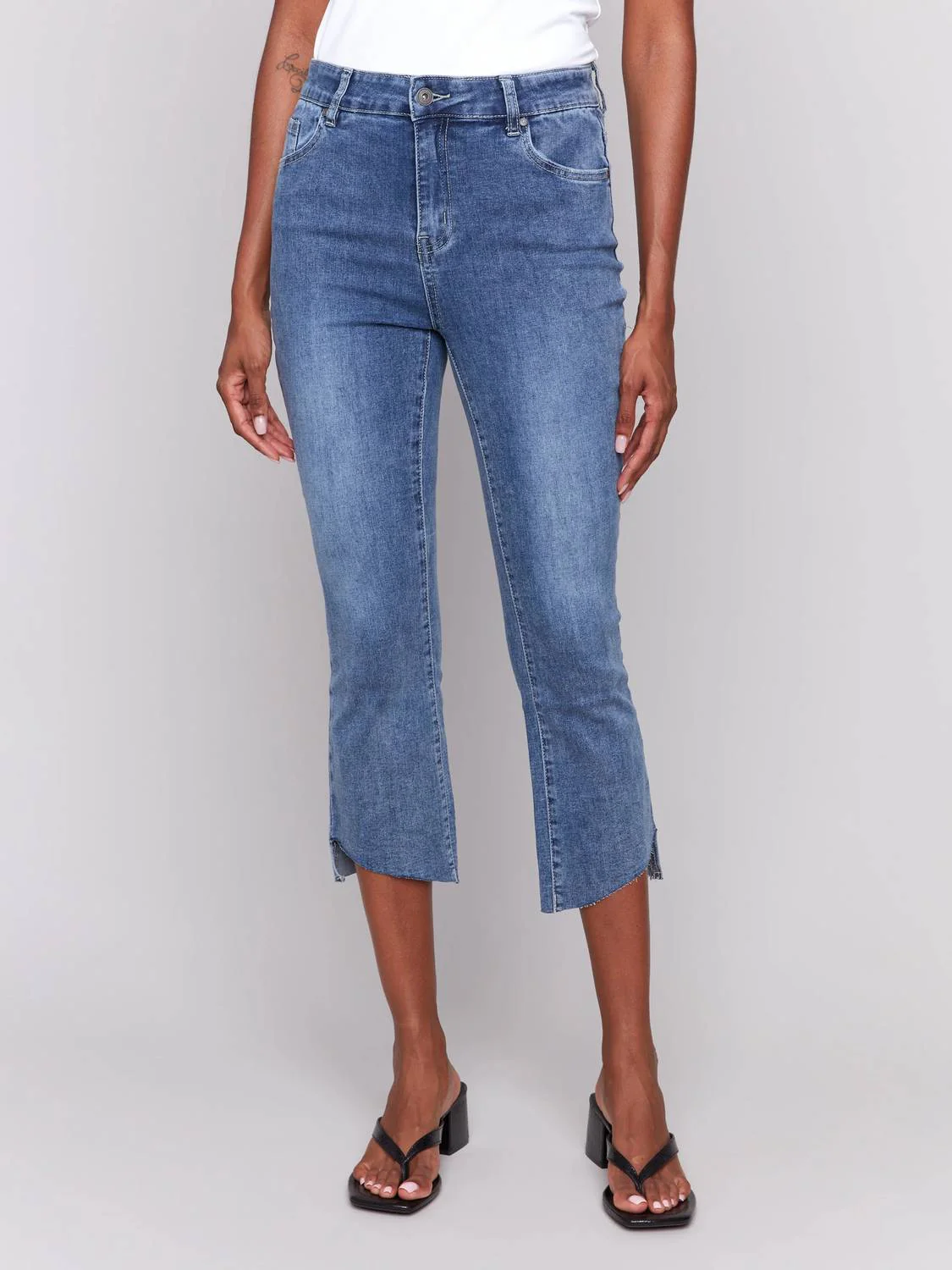 Cropped Jeans With Asymmetrical Hem In Medium Blue