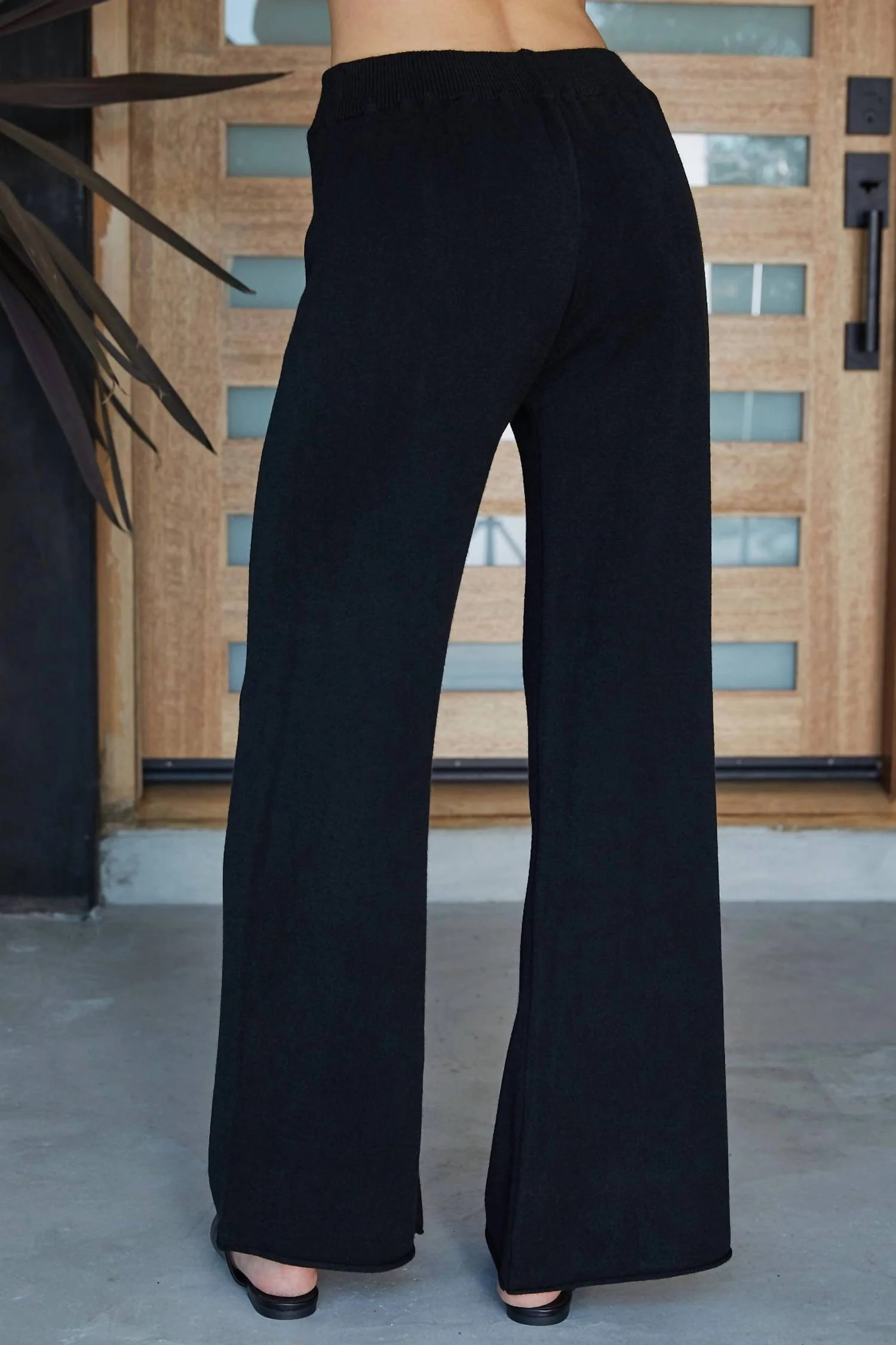 Italian Viscose Knit Flared Pants In Black
