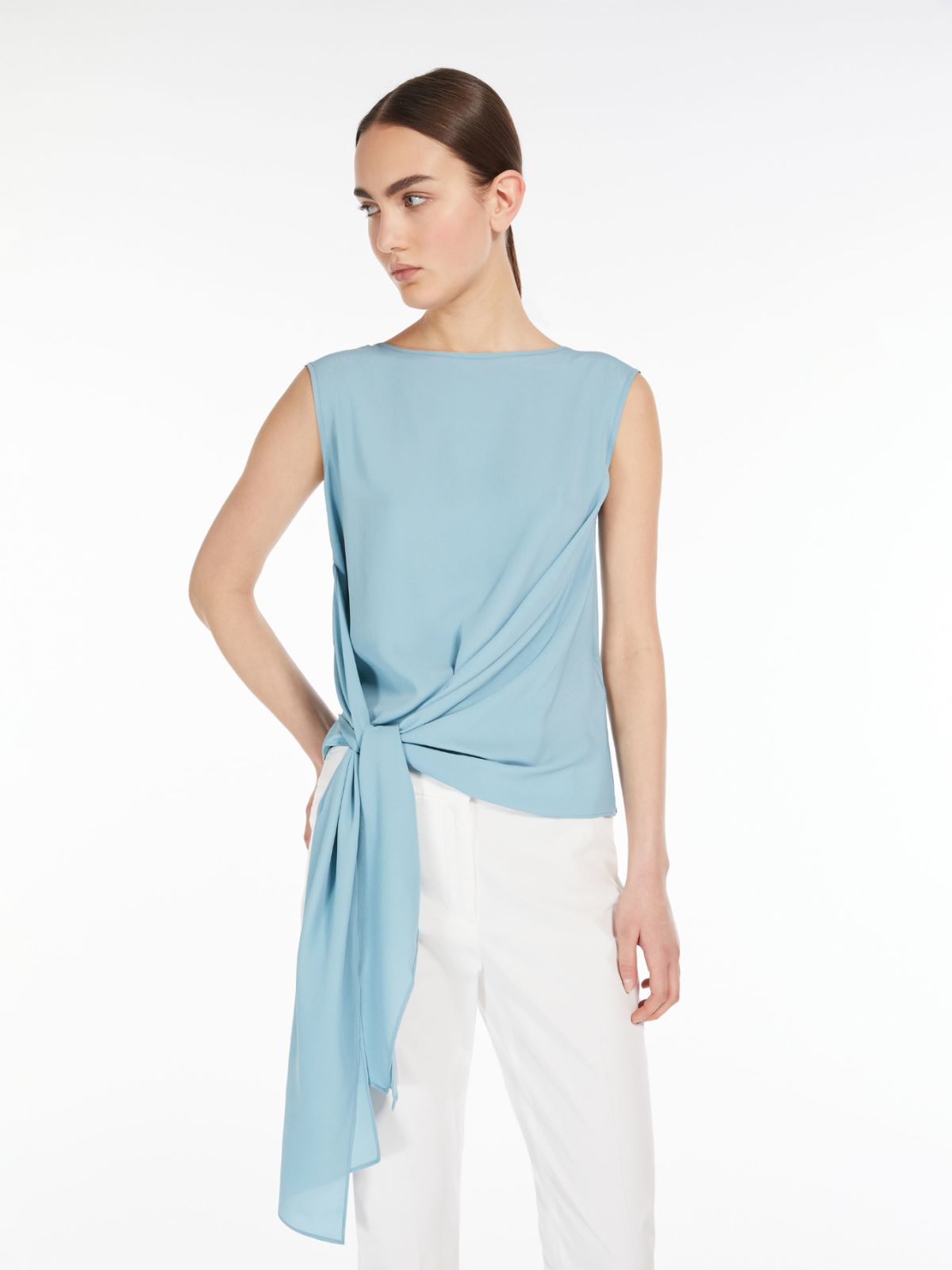 Top in jersey e crêpe