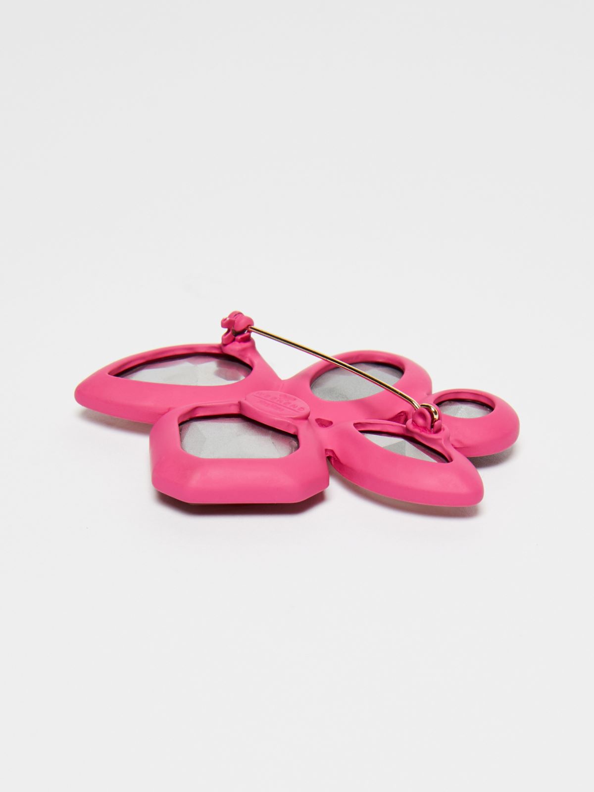 Spilla in metallo e vetro