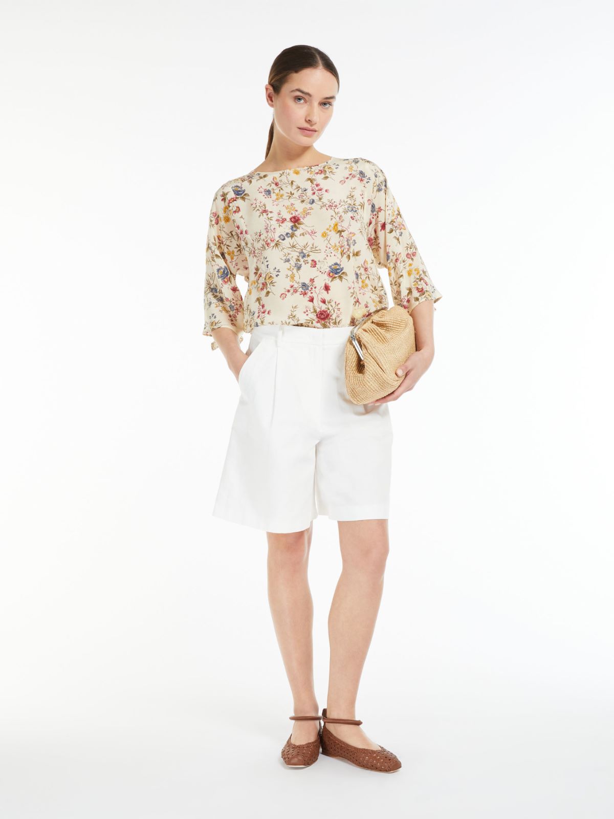 Blusa svasata in seta stampata