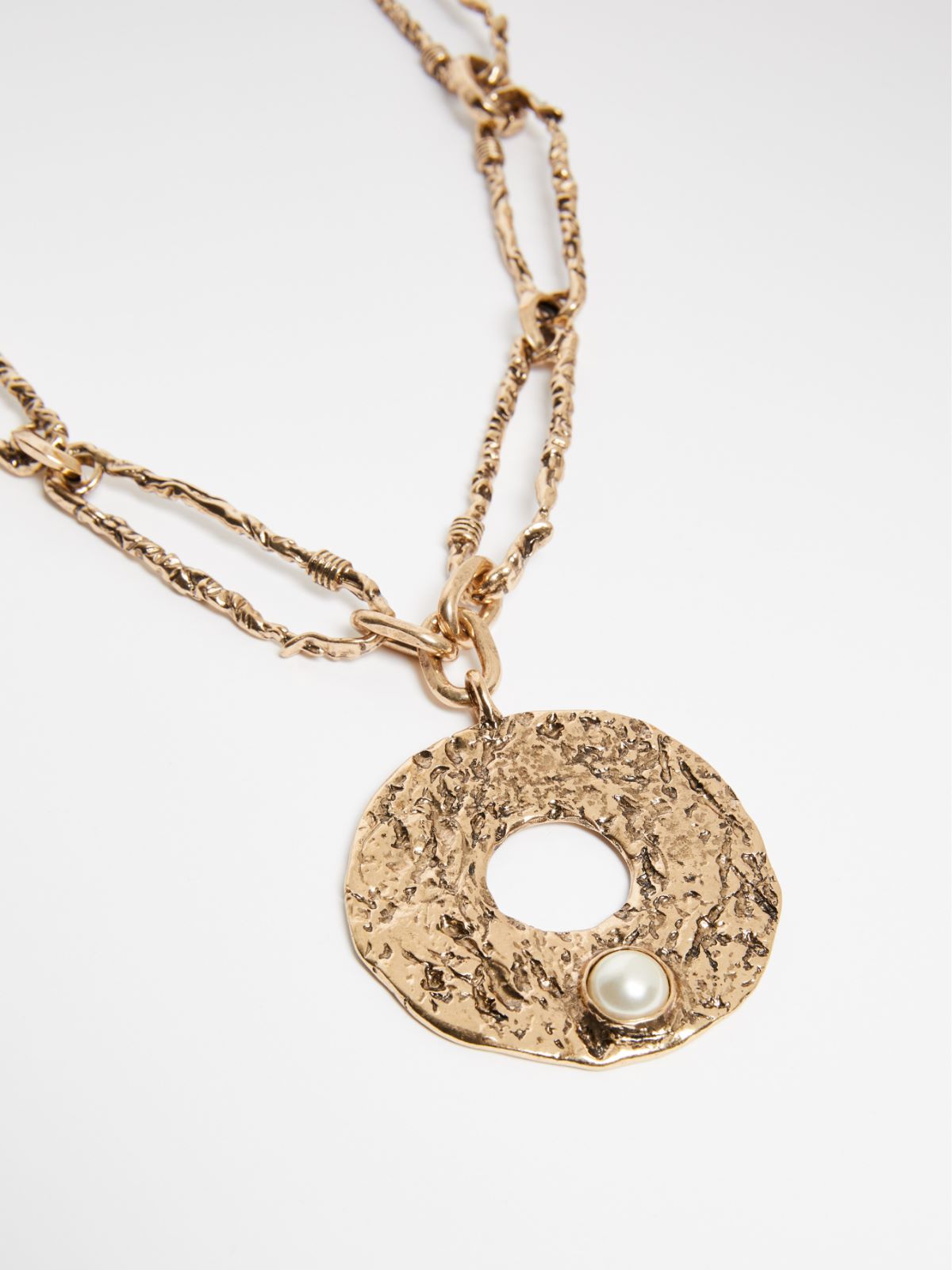 Collana con spille da balia