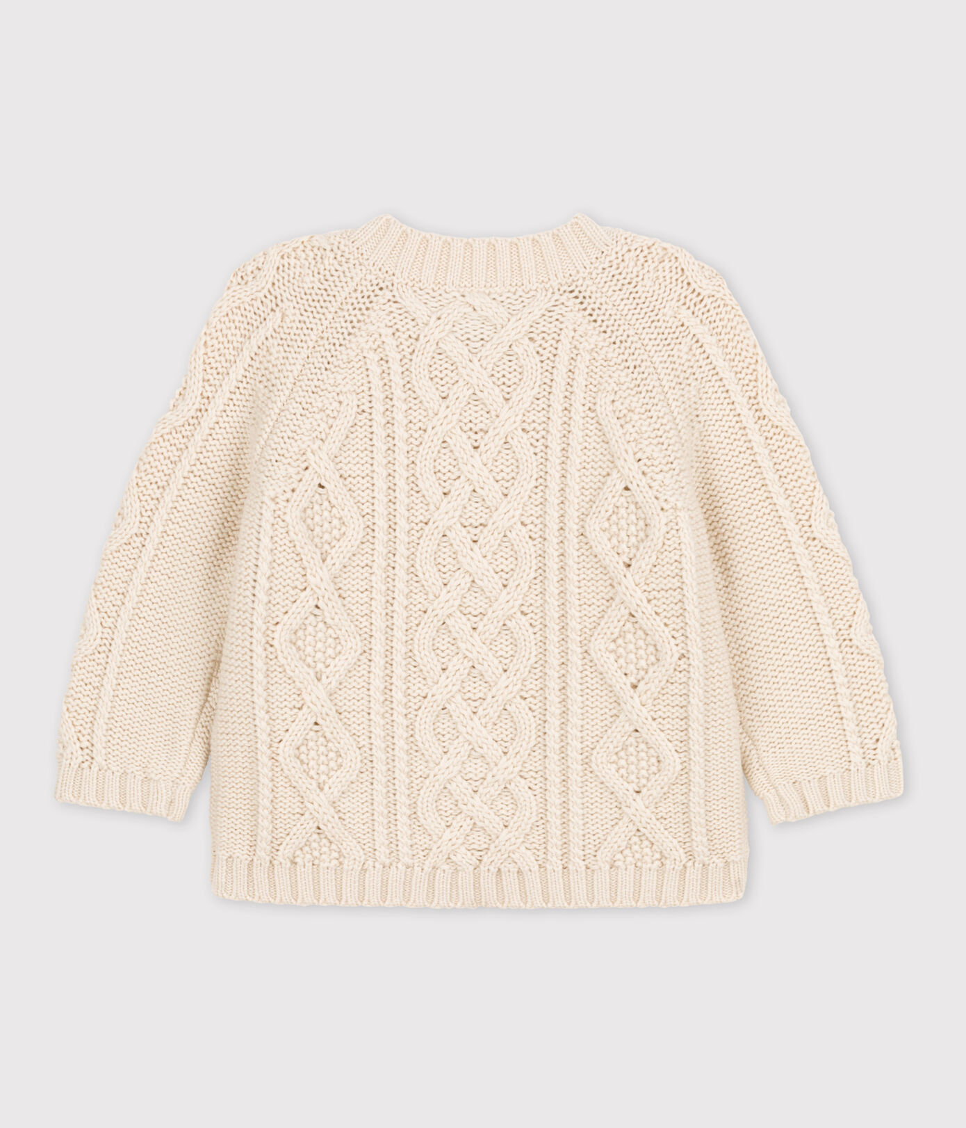 Pull bébé en tricot de coton à torsades