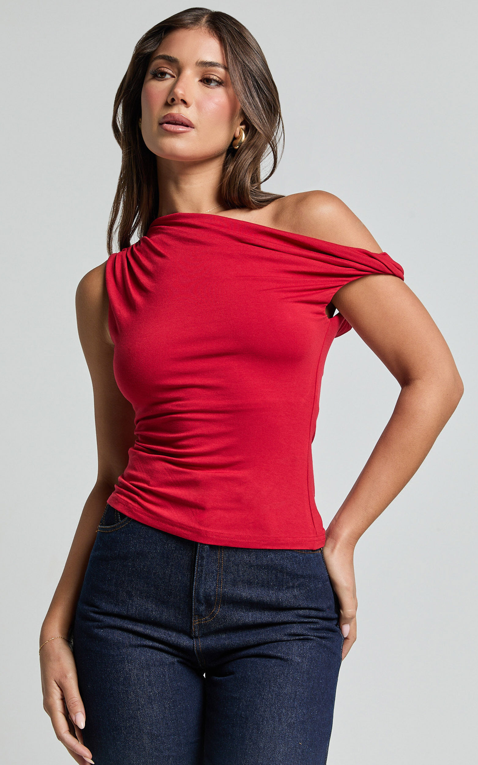 Jialeen Top - Off Shoulder Twist Asymmetrical Sleeve Top in Red