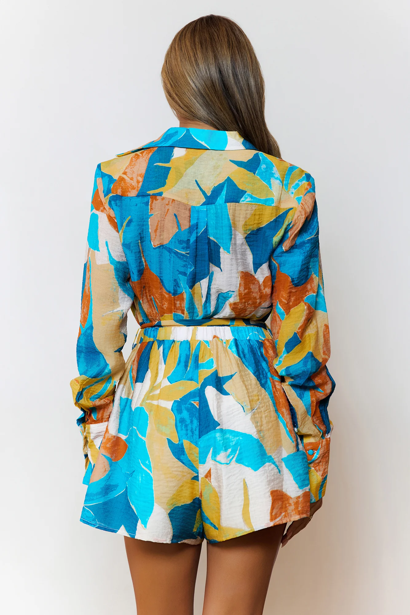 Tropic Tempo Long Sleeve Romper Teal