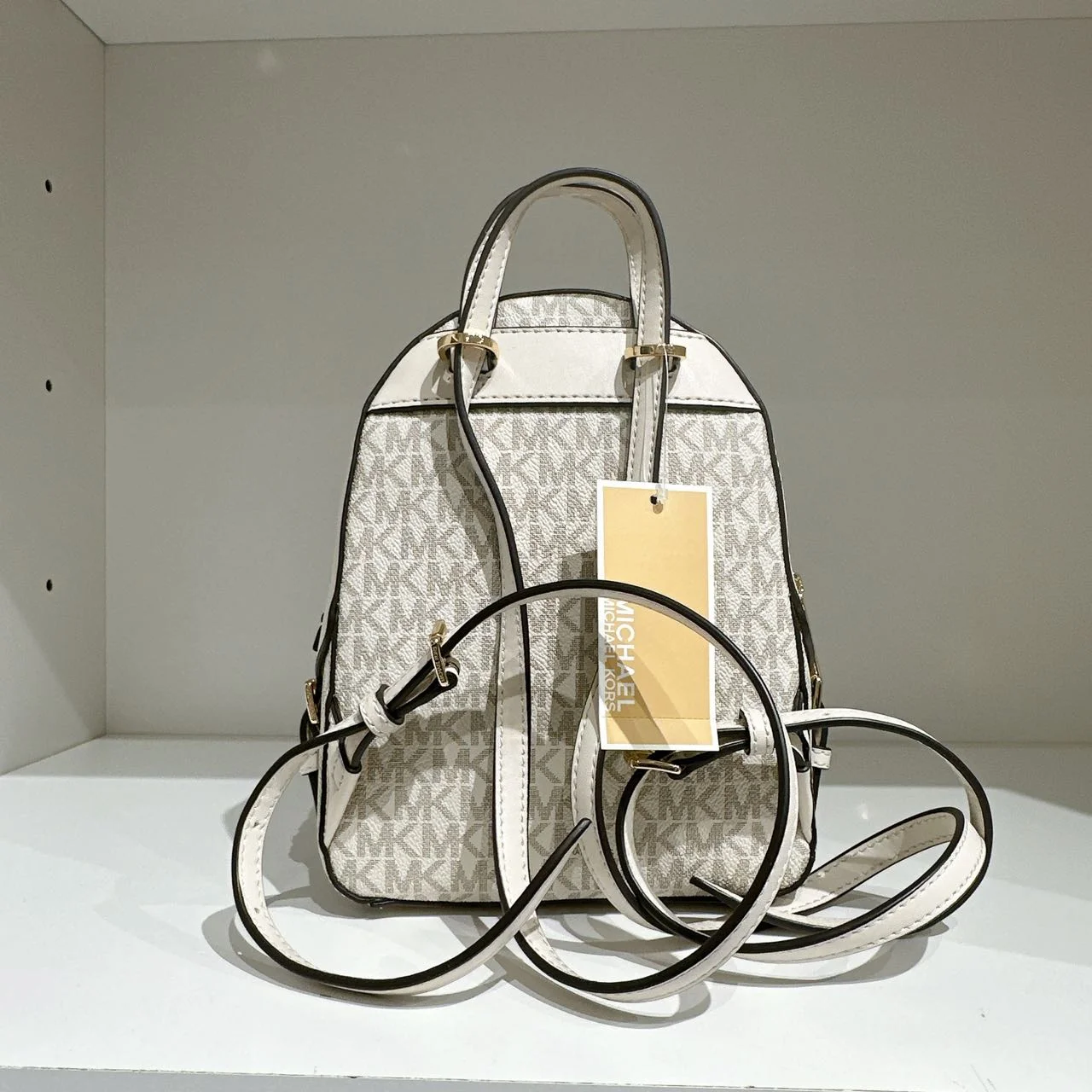 Michael Kors Jaycee Mini XS Light Cream PVC Zip Pocket Shoulder Backpack Bag