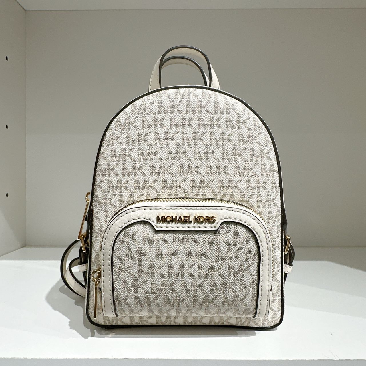 Michael Kors Jaycee Mini XS Light Cream PVC Zip Pocket Shoulder Backpack Bag