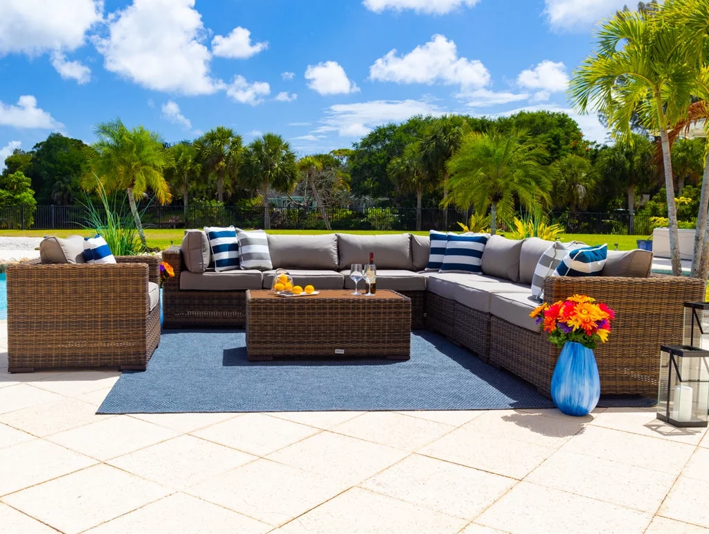 Tuscany 9-Piece Resin Wicker Outdoor Patio Furniture Sectional Sofa Set in Brown w/ Seven Modular Sectional Seats, Armchair, and Coffee Table (Half-Round Brown Wicker, Polyester Light Gray)